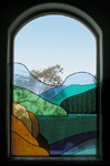 Stain Glass Panel mounted in a window space